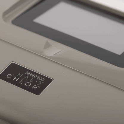 Close-up of a device with 'Astralpool Halo Chlor' branding on a metallic surface.
